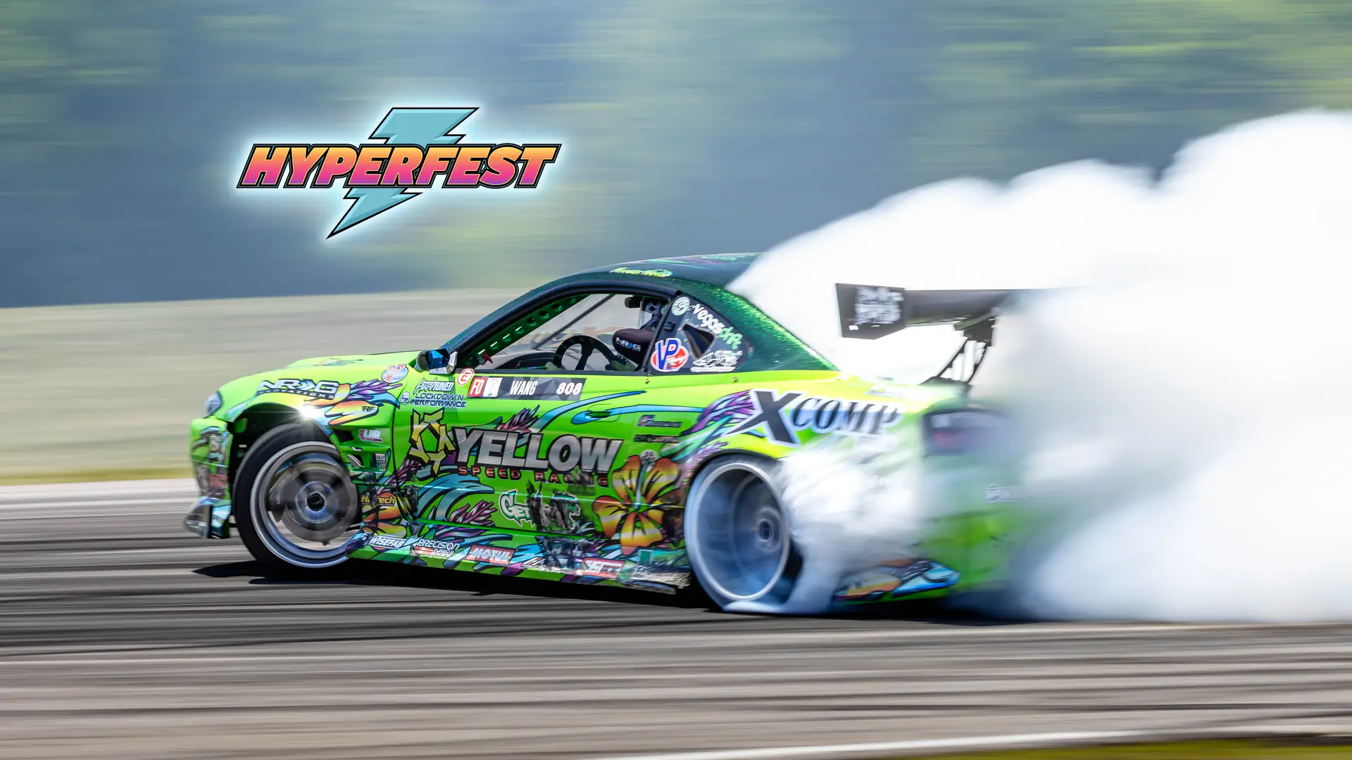 HyperFest logo above a drift car throwing tire smoke at Virginia International Raceway